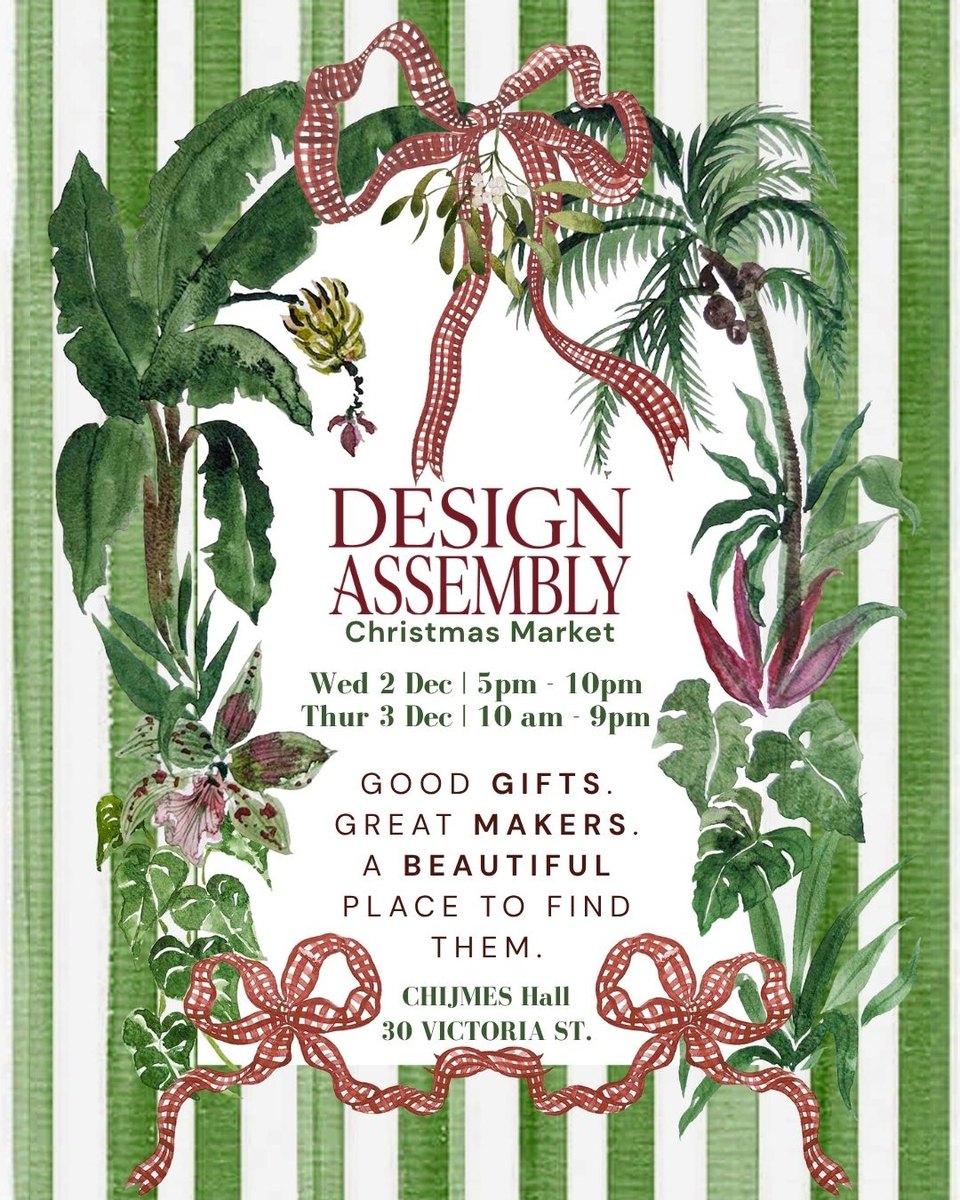 The Design Assembly Christmas Market invitation: a tropical frame of banana leaves, palms and orchids tied with red gingham bows, on green stripes, with the event dates and venue