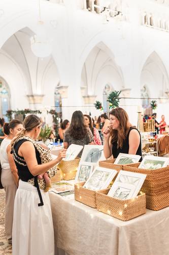Shoppers browsing framed art prints